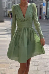 Mint green pleated cake dress