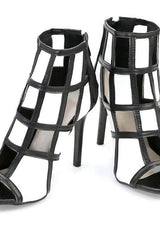 Elegant black & white short boots