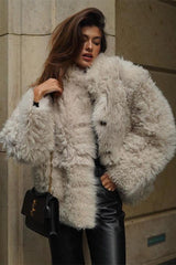 Loose buttoned artificial fur coat
