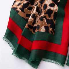 Leopard Print Scarf With A Red And Green Trim