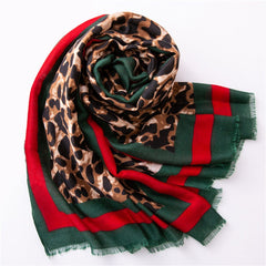 Leopard Print Scarf With A Red And Green Trim
