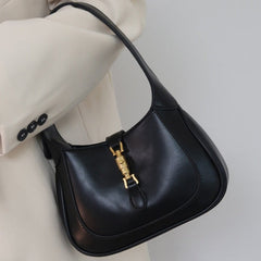 Black Classic Curved Leather Handbag with Signature Buckle Closure
